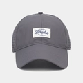 Detail of dark grey quick-dry baseball cap with laser-cut ventilation holes and patch - Adjustable / Gray