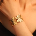 Elegant adjustable golden stainless steel leaf bracelet with intricate butterfly design - Butterfly Bangle