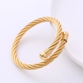 Elegante bracciale rigido a fune intrecciata color oro con estremità a sfera lucide - Cavo Oro Testa Dorata