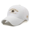 White cotton baseball cap with gold embroidered lettering and curved brim style - White