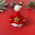 Miniature Christmas pet hat with red bow and gold star on a festive red background - Red Christmas Star Hat