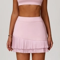 Gonna-pantalone sportiva rosa chiaro a vita alta con orlo a pieghe e pantaloncino interno - L / Rosa Pesca