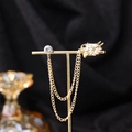 Gold dragon brooch pin with rhinestones and elegant hanging chain for vintage styling - Gold