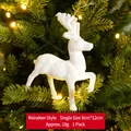 Sparkling white reindeer ornament on festive Christmas tree with warm lights - Deer