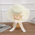 Elegant beige straw sun hat with delicate lace trim, ribbon bow and pink floral accent - Flat Top Flower Knot - Creamy White