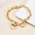 Bracciale con doppio ciondolo a cuore con chiusura a levetta OT e maglie dorate spesse - Bracciale Toggle Doppio Cuore (M603) / Oro