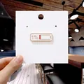 Cute metal enamel pin featuring 1 percent low battery icon on a white backing card - 88*Battery 1 Percent Pin