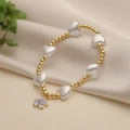 Elegante pulsera de cuentas doradas, perlas de imitación y un colgante de flor - Colgante de Flor de Cinco Pétalos / Morado