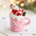 Figura de Papá Noel en taza rosa de resina para decoración de mesa navideña - Taza de Papá Noel Rosa