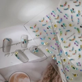 Macro shot of 3D rhinestone nail art stickers with colorful gems on clear adhesive backing - Multi-shape Colorful 3D Jewel Style (CO-404)