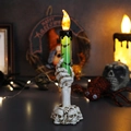 Grüne flammenlose Skeletthand-Kerze mit Totenkopf-Sockel und Fledermausdekor für Halloween - Einzelne Geisterhandkerze / Grün