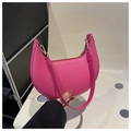 Detail view of the elegant crescent bag in rose pink with high-quality metal zipper - Rose Red