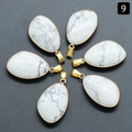Set of six teardrop-shaped white turquoise pendants with gold alloy borders and stone textures - Howlite (Single)