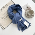 Soft cashmere-feel solid blue scarf with tassel fringe detail and brand tag - Denim Blue