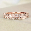 Macro di anello a tre strati in oro rosa con diamanti a taglio baguette e tondo - US 7 / Oro rosa