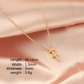 Golden Sagittarius zodiac pendant necklace on pink silk fabric with size specifications - Sagittarius