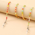 Macro detail of multi-colored crystal bead eyewear chain with silver lobster clasps - Mixed Red