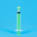 Green 10ml oral medicine syringe with clear barrel and dual ml/tsp measurement scales - 10ml Green Independent Packaging