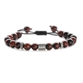 Detail of red-brown tiger eye stone beads with silver metal carvings on braided cord - Red Tiger Eye