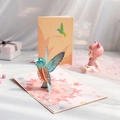 3D hummingbird greeting card featuring blue bird and maple leaves in a laser cut design - Maple Leaf Bird