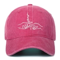 Close-up of vintage washed pink cotton baseball cap featuring artistic hand embroidery - Rose Red