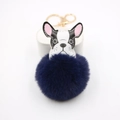 Blue faux fur ball keychain featuring a black and white French Bulldog leather charm - Navy Blue
