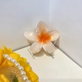 Elegant gradient orange plumeria flower hair claw clip with a shimmering resin finish - 8cm / Orange