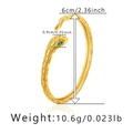 Detailed view of gold snake bracelet showing size 6cm diameter and weight 10.6g - Snake with Green Eyes