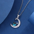 Detailed view of silver moon pendant with blue nebula sphere and sparkling stars - Silver Dreamy Planet-2