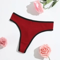 Detail of dark red ribbed cotton thong with black contrast trim and high-cut leg - Burgundy