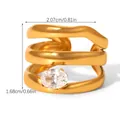 Macro detail of gold-plated layered wavy ring featuring an oval zircon center stone - Clear Oval Zirconia Triple Layer Wave (HC-R30537-WT)