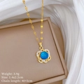 Collar de flor dorada de lujo con gema azul y cristales sobre fondo de seda suave - Colgante con Forma de Corazón Que Cambia de Color Sensible a la Temperatura Estilo Dorado (H308)