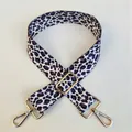 Macro shot of purple leopard print bag strap with adjustable golden metal hardware - Pattern 45 Gold Clasp