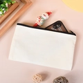 Creamy white canvas pencil case with black zipper closure on minimalist desk setup - 21*12 Black