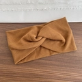 Brown knitted ribbed sports headband with twist design for running and fitness - Ribbed Style / Brown