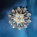 Elegant rose gold camellia brooch with white faux pearls and sparkling crystals - Gold-Edged Pearl Corsage