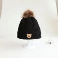 Kids black knitted beanie hat with a brown faux fur pom-pom and cute bear patch - Bear Label Single Hat / Black