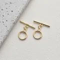 Macro shot of 14K gold plated OT toggle clasp for DIY necklace and bracelet jewelry making - Style J Shiny Round / 14K Gold