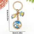 Marine themed mermaid and starfish keychain with blue ocean round pendant and gold plating - Blue Enamel Mermaid Conch Style (ER1922)