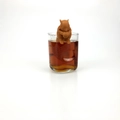 Brown squirrel silicone tea infuser hanging on glass cup for loose leaf tea brewing - Squirrel Coffee