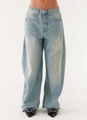 Front view of light blue wide-leg denim jeans with a vintage wash on a studio model - S / Single Pants