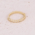 Macro shot of gold adjustable ring with row-set zircons on pink stone background - Clear Pave Zircon Style (7#)