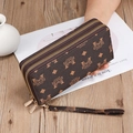 Detail view of double zipper brown wallet with lychee grain and detachable wrist strap - Brand Letter Print / SLW-205 Coffee