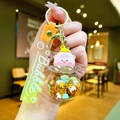 Detail of pink cartoon pig keychain with liquid glitter ball and yellow wrist strap - Gradient Rope [gold] Light Pvc Peach Pig