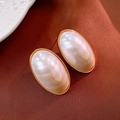 Elegant gold oval stud earrings with iridescent white mother of pearl inlay - White Mother of Pearl Oval