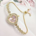 Golden heart-shaped quartz watch with rhinestones and pink dial on floral background - Gold Case Pink