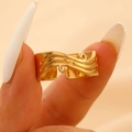 Chic gold-plated open ring with triple-layered wave texture in a minimalist luxury style - Eco-Friendly KC Gold Wave Pattern (WG-0256)