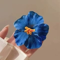 Vibrant blue hibiscus flower hair clip with yellow stamen for women beach hair styling - Blue Hibiscus Hair Clip