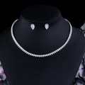 Silver bridal jewelry set with white zircon necklace and drop earrings on black velvet - White Gold