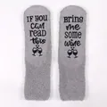 Grey fuzzy coral fleece socks with non-slip wine-themed text on the soles - One Size / Light Grey + Black Glue